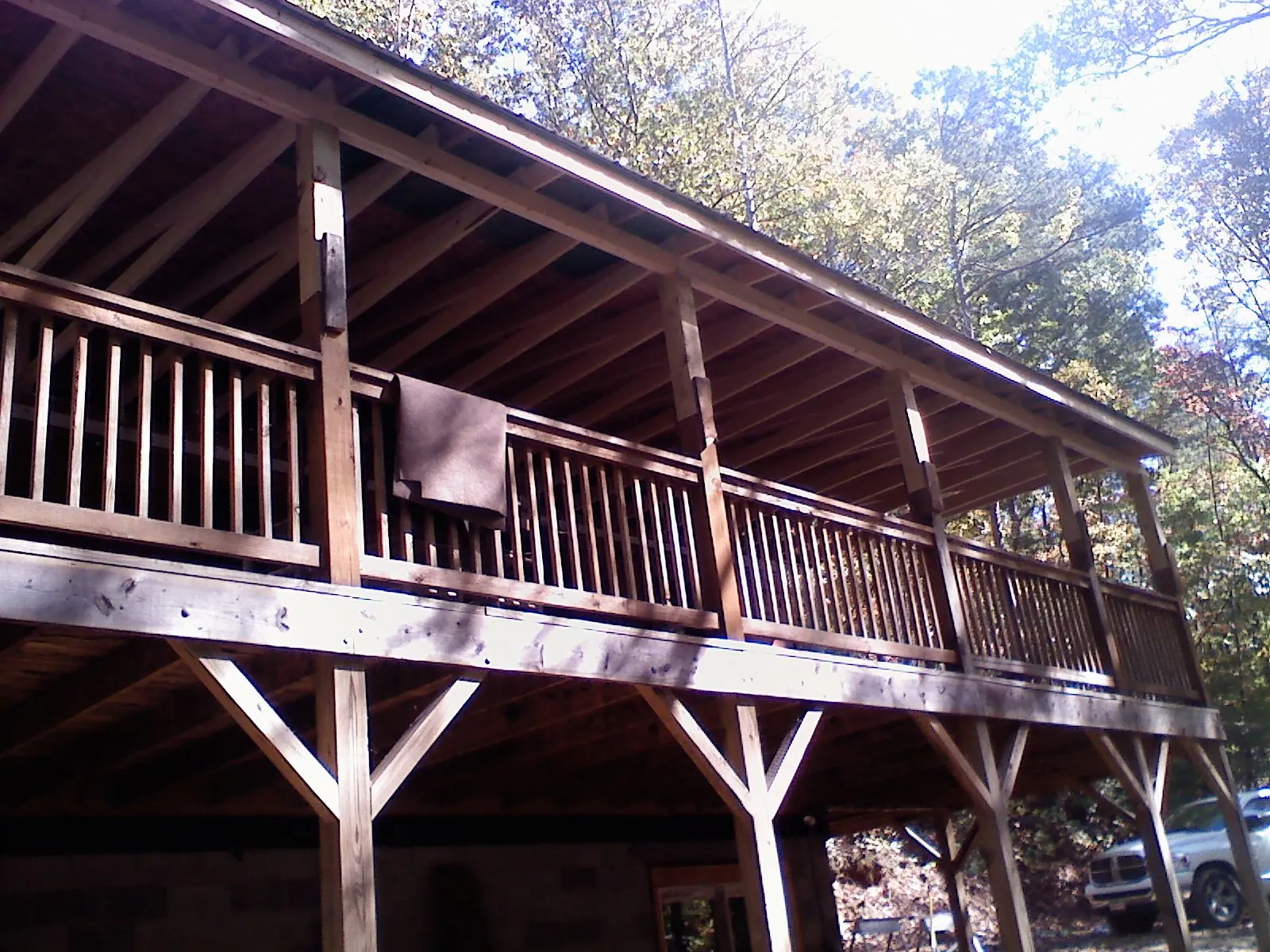 Timber framing under a new elevated porch and deck — Roof Leak Repair in North Scituate by Roofing Brothers
